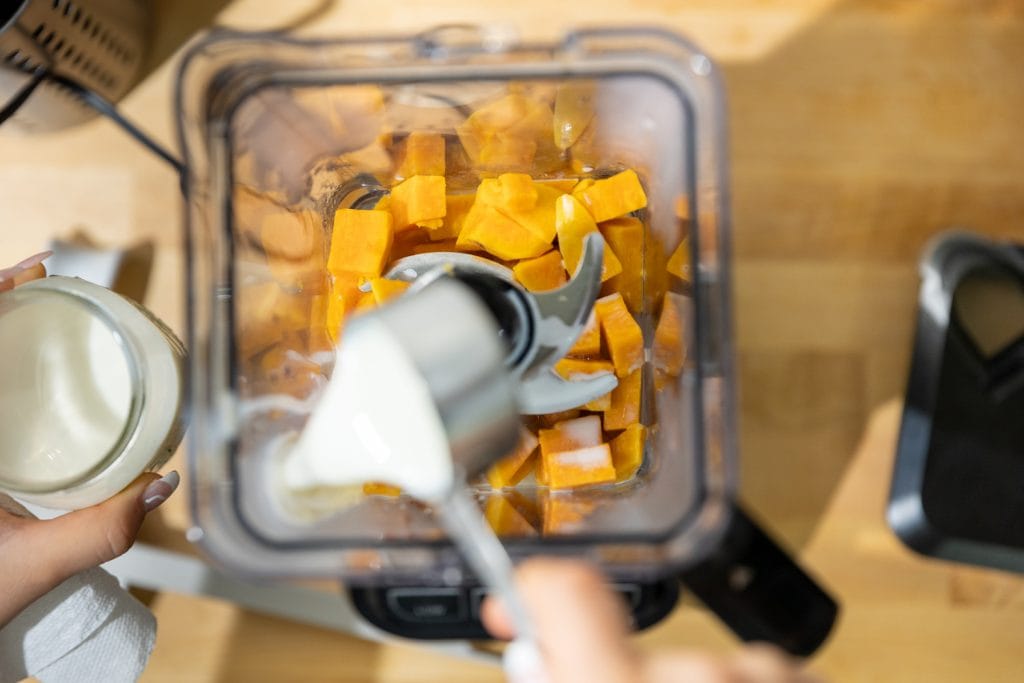 blending sweet potato with milk